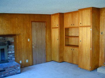 oiled paneling and new door hung with new passage lockset and deadbolt