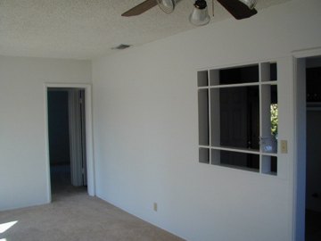 Living room with new paint and carpet