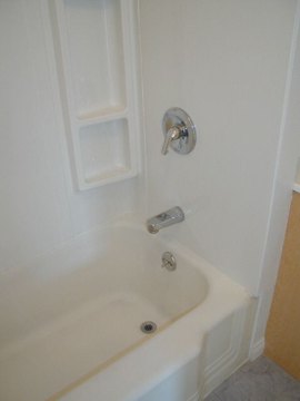 Install new shower & tub supply and new shower surround